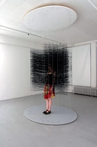 Karilee Fuglem, "There's a place on my back that isn't there", polyester-wrapped elastic thread, rubber o-rings, steel cables, wood and steel platform