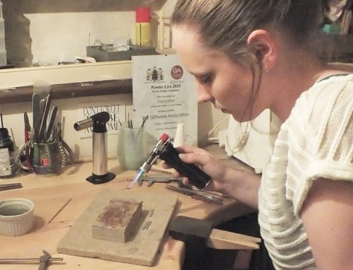 Stacey West at work in her studio