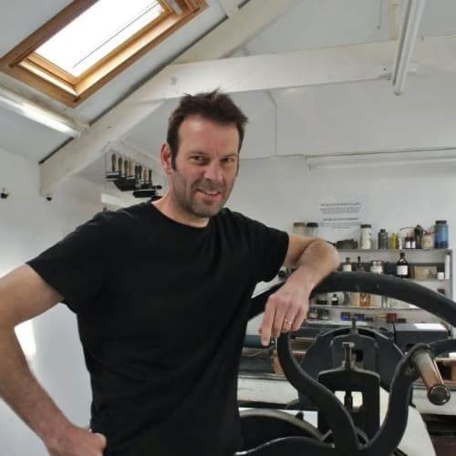 Trevor Price in his printmaking studio