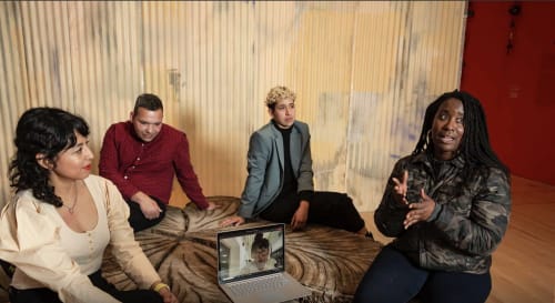 SECA Art Award recipients Maria A. Guzmán Capron (left), Gregory Rick, Marcel Pardo Ariza, Binta Ayofemi and Cathy Lu (on Zoom) chat during an interview in the 2022 SECA Art Award Exhibition at the San Francisco Museum of Modern Art in February.