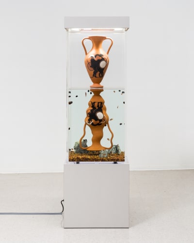 Cammie Staros, Narcissus in Love, 2022. Ceramic, acrylic, wood, laminate, powder-coated steel, water, aquatic filtration system, programmed grow light, seiryu stone, 76 x 19 x 19 in. Courtesy of the artist and Shulamit Nazarian. Photo: Ed Mumford.