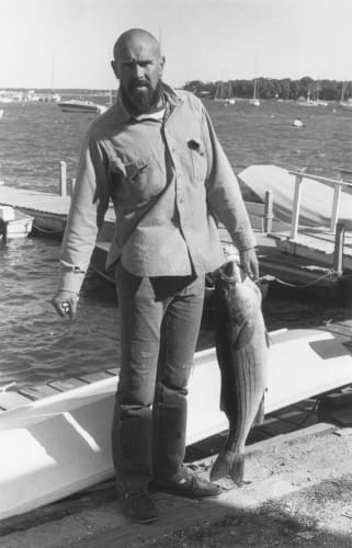 Alan Shields standing with a fish