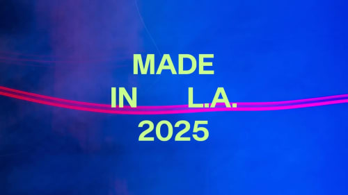a logo that is blue that says Made In L.A. in yellow green font