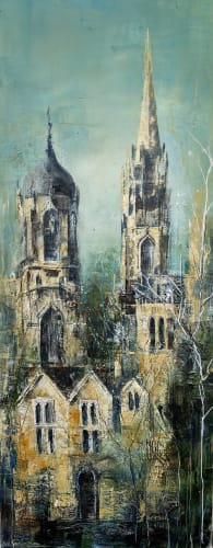 Bee Bartlett view of Oxford spires against a bright turquoise blue sky and the outline of a birch tree in the foreground.