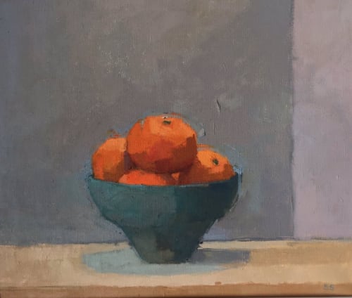 Sarah Spackman still life study of a oranges in a dark teal bowl against a dusky purple gray background.
