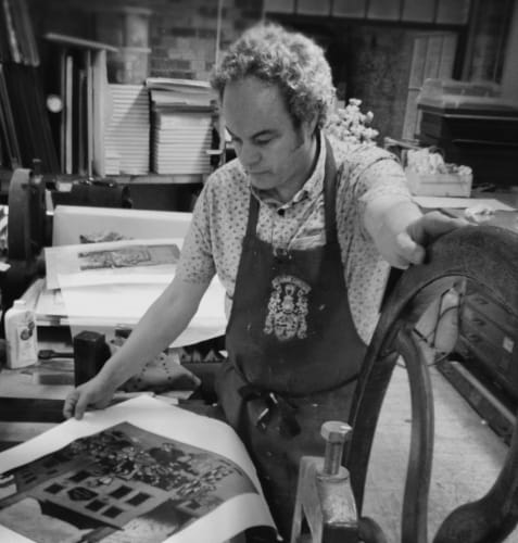 Mychael Barratt photo in black and white of him printing press.