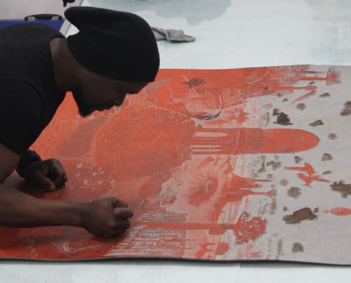 Ade Adesina at work in his studio.