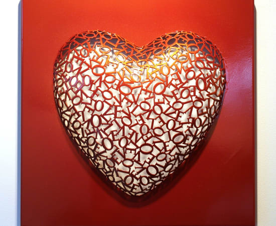 Heart shaped wall sculpture made with the ltters 