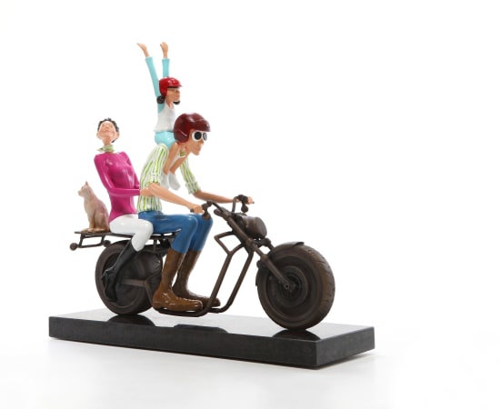Contemporary sculpture of family riding a motorcycle