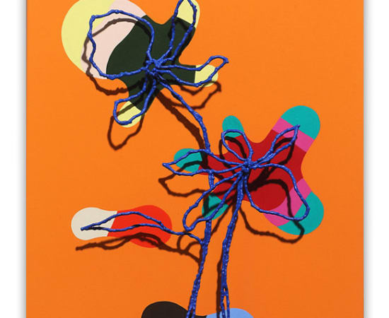Modern wall sculpture of painted flower made of steel
