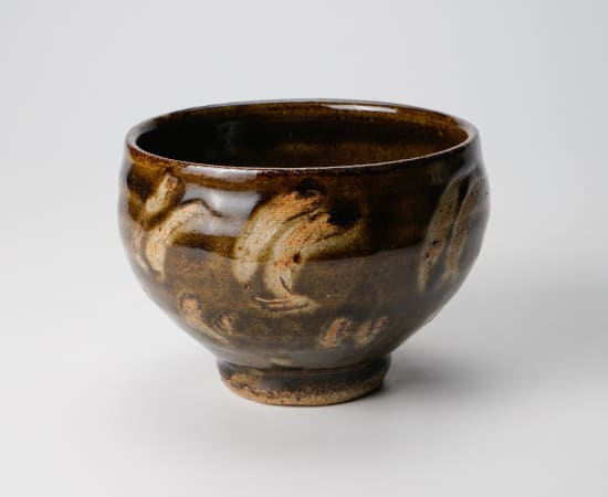 Hamada Shoji 濱田庄司, Amber glazed tea bowl with finger painting