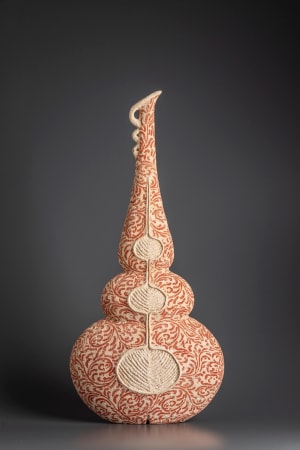 Ceramist Avital Sheffer, from Israel and New South Wales, Australia. Hand built earthenware vessel with stencilled red pattern. Contemporary sculptural artwork with middle eastern influence.