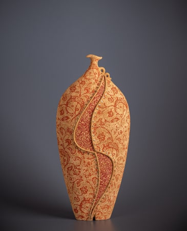 Orange ceramic vessel by artist Avital Sheffer, exhibited at the Rebecca Hossack Art Gallery.