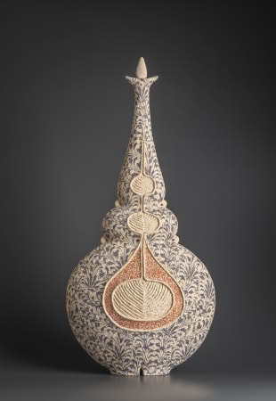 Ceramist Avital Sheffer, from Israel and New South Wales, Australia. Hand built pointed earthenware vessel, stencilled with blue and orange pattern. Contemporary sculptural ceramic artwork with middle eastern influence. 