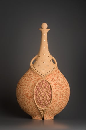 Ceramist Avital Sheffer, from Israel and New South Wales, Australia. Orange patterned earthenware. Contemporary ceramic artwork with middle eastern influence and anthropomorphic shape..