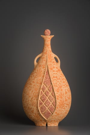 Anthropomorphic ceramic artwork by ceramist Avital Sheffer, from Israel and New South Wales, Australia. Orange earthenware vessel with stencilled red and orange details. Contemporary sculptural artwork with middle eastern influence. 