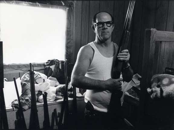 Junior with his gun collection, Cumberland, Kentucky, 1987