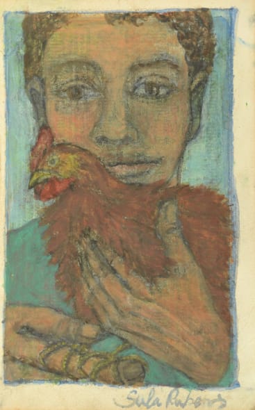 Youth holding a Chicken