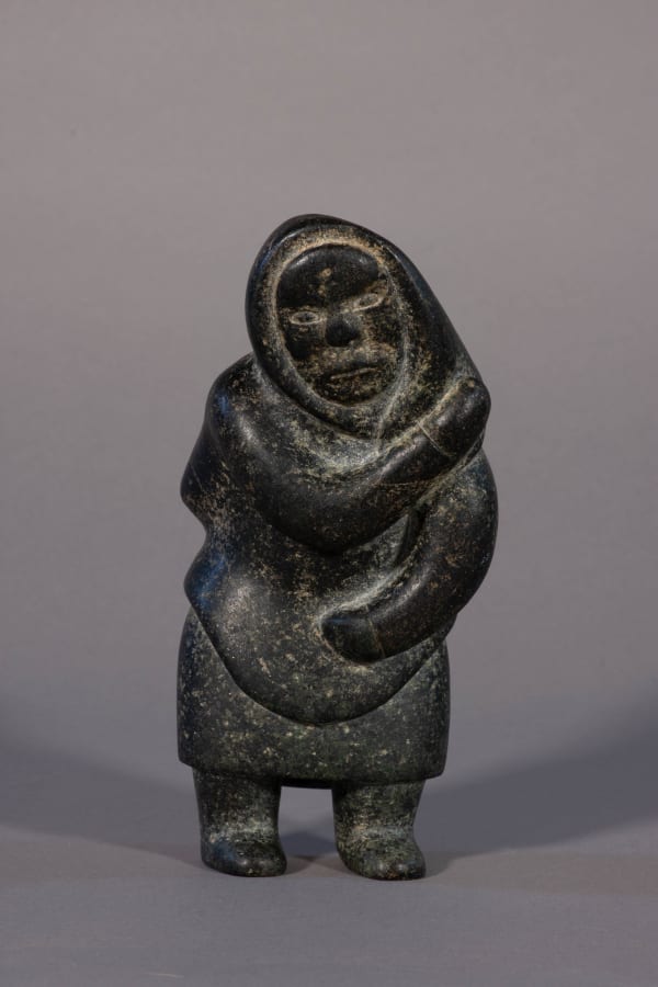 Niviaqsi - Woman Adjusting Her Hood / femme ajustant sa capuche, ca. 1955