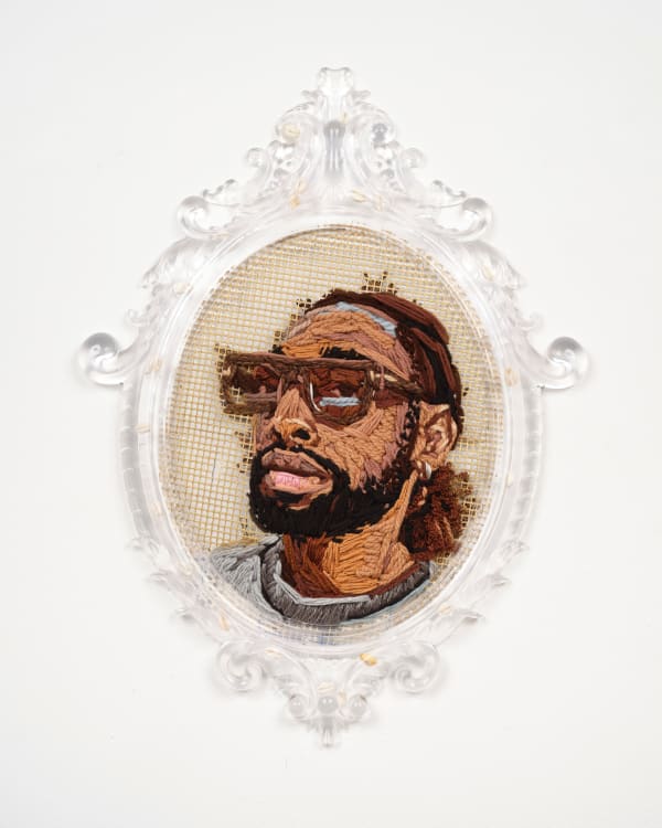 Kandy G Lopez City Boys: Olivier, 2025 Yarn and spray paint on hook mesh with handmade artist's frame (epoxy/resin and cowrie shells) 29 1/4 x 21 1/2 in 74.3 x 54.6 cm