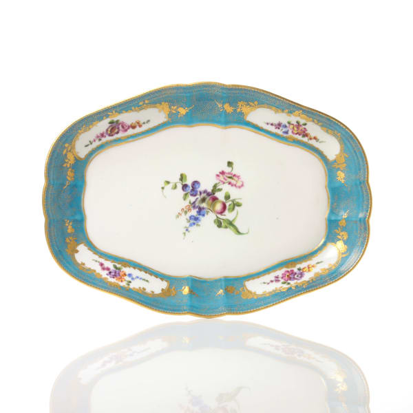 Sèvres Porcelain, A Soft-Paste Vincennes Porcelain Dish with bleu céleste sablé d’or ground, 1754