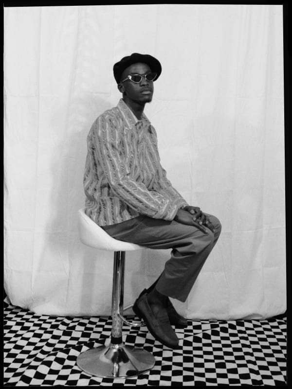 Marc Posso photograph. Gabonese Artist. Young artist. Contemporary african art in Paris. AFIKARIS Gallery. Self-taught Photographer. Figurative photography. Photography printed on canvas. Diversity of the African continent. Bold colors. Contrast of colours. Black beauty.