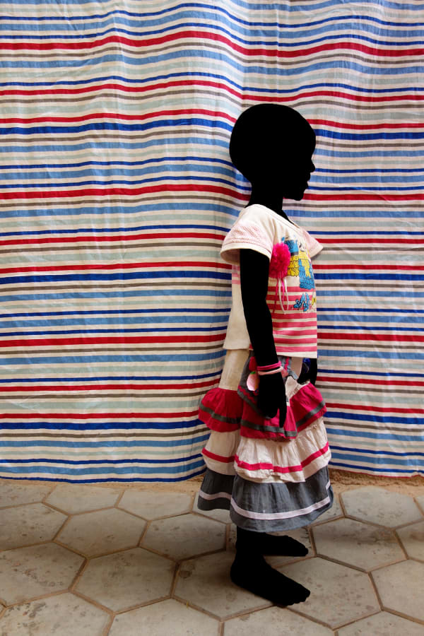 Saidou Dicko photograph. Burkinabè Artist. Contemporary Art. Self-taught artist. Painted photography. Watercolour on paper. Echoes to Peulh tradition. Figurative and poetic photography.