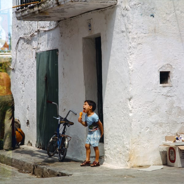 Walter Rudolph, Young Boy eating an ice cream, Ibiza, Spain, 1976