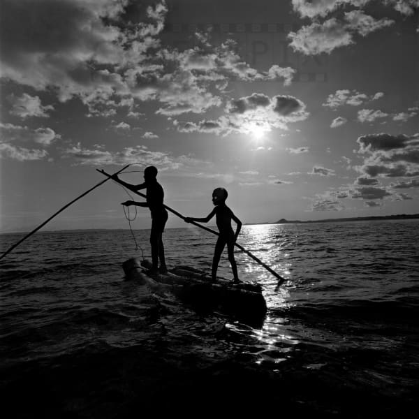 Mohamed (Mo) Amin, El-Molo boys fishing on Lake Turkana, Kenya, 1970/1980
