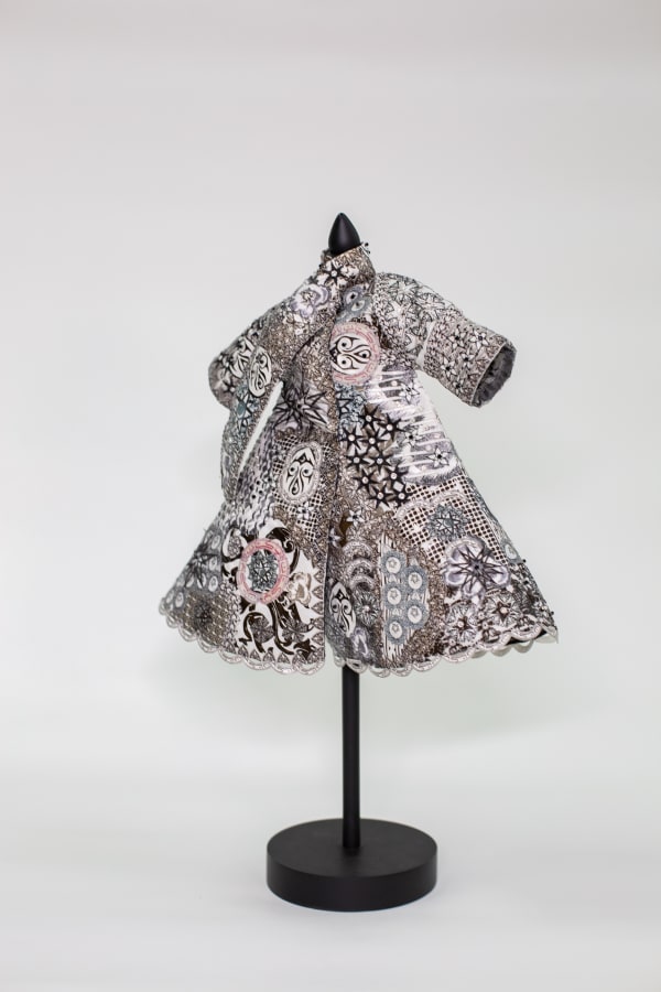 Gambeson known as an ancient coat for defence is a padded jacket worn as an armor. The construction of this coat is entirely done by leftover pieces from the previous works which were meticulously hand printed and hand cut, later hand stitched to this garment. The leftover pieces join together to make an organic design without following any trace line.