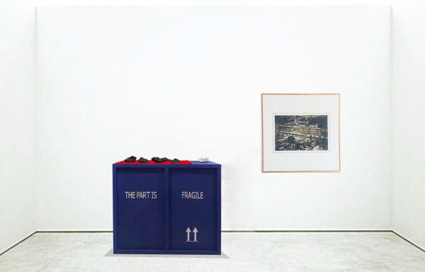 Memorial of 7543207,100.4948230 in 1943 & Black bricks on blue crate