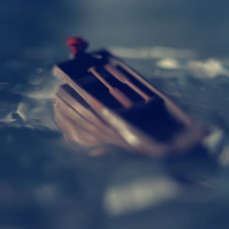 scales glinted laughter mocking the sunshine metal blade against the iridescent crescent plotting