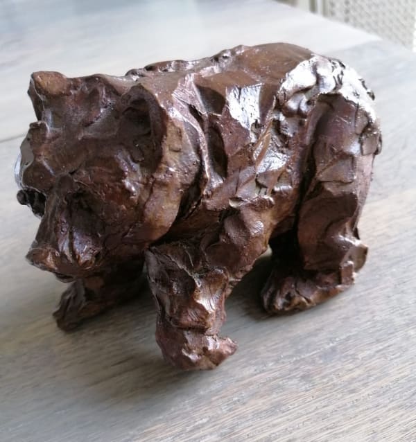 Small bear cub, contemporary animal bronze sculpture by Bast, expressive figurative artwork with textured surface, collectible sculpture suitable for indoor and outdoor display