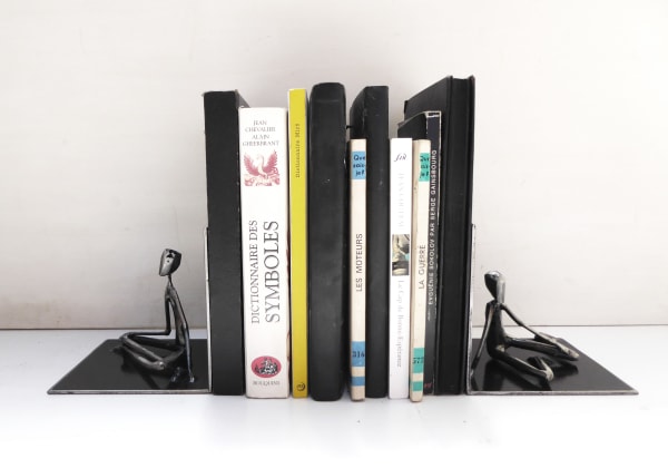 library, sitting, book holder, push, steel sculpture, joy, person, figurative art, caroline brisset, contemporary art, solitude, covid-19, art thema heyi gallery, brussels