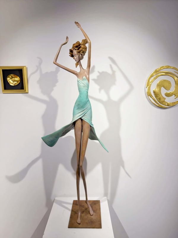 Moonlight dancing girl sculpture of Hedwige Leroux contemporary bronze sculpture dancer woman sculpture a girl in a green dress dancing freely Art Yi gallery in Brussels