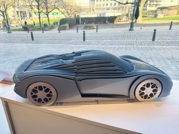 Porsche fancy blue racing car sculpture Jean Paul Kala contemporary sculpture car lover Art Yi gallery Brussels art gallery