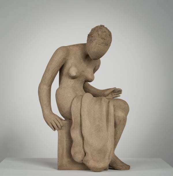 Figurative ceramics sculpture by artist Emilio DiIorio. Female figure is No. 4 in artist's Seated Bathers series in gray clay.