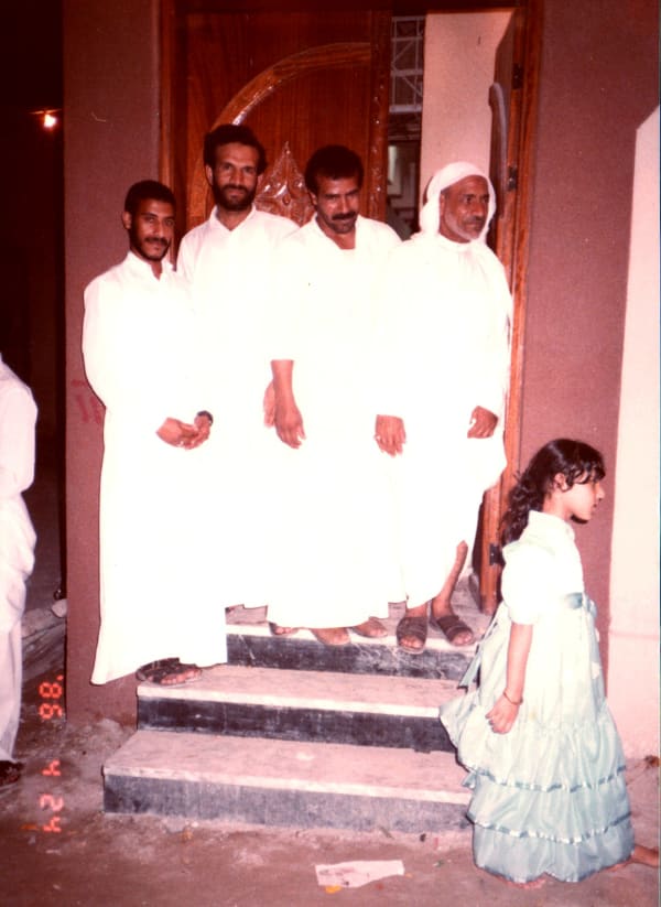 Family Members Posing at Our Doorstep from the series Sanabises, 2017