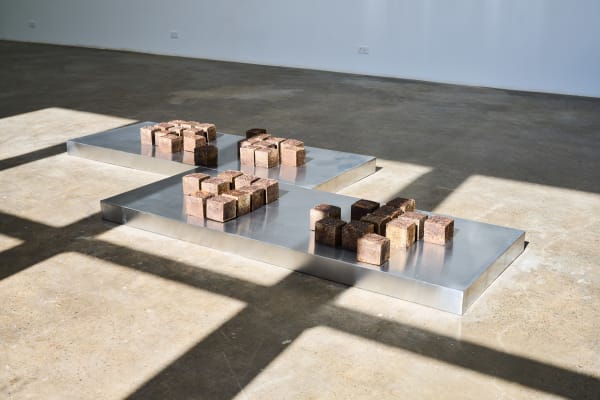 Sara Abdu A Landscape of a Memory , 2026 A mixture of Bakhoor ingredients on a steel plinth 80 x 200 x 10 cm (per plinth), 2 plinths