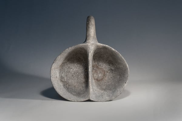 A Large Basalt Stone Double Mug, Chalcolithic period, Circa 3100 B C.E.