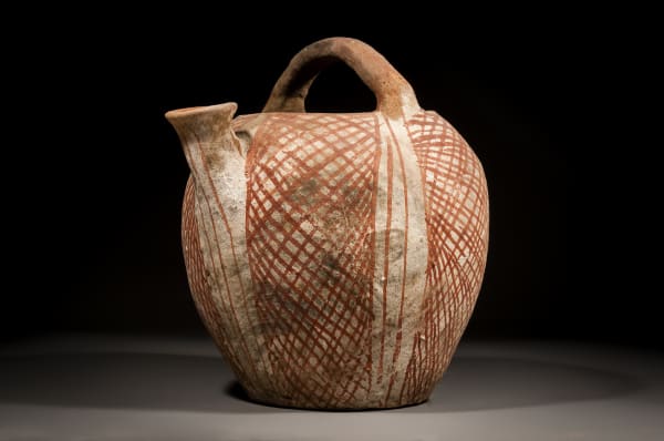 A Canaanite Basket Handle Spouted Jug, Early Bronze Age I, 3500 B.C.E. - 3000 B.C.E.