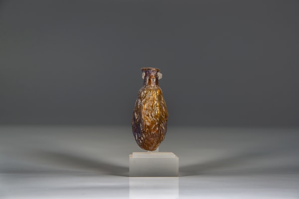 A Glass Perfume Flask in the Form of a Date, Roman period, circa 100 C.E.