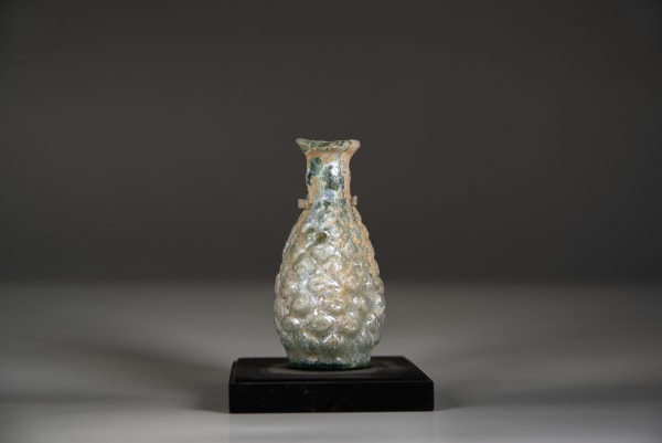  A Glass Mold Blown Flask in the Form of a Pine Cone, Roman period, circa 200 C.E. – 300 C.E.