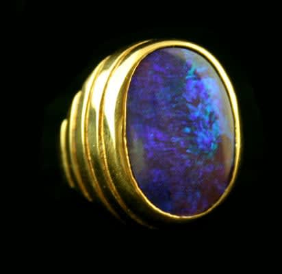 18 Karat Gold Ring Featuring a Boulder Opal