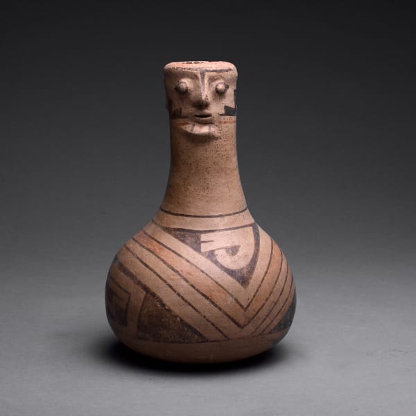Casas Grandes Polychrome Human Effigy Vase