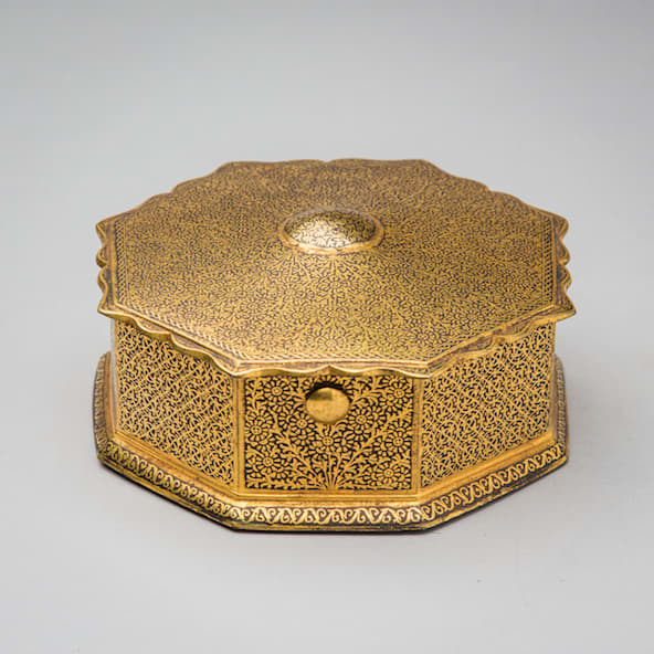 Indian gilt damascened octagonal box, decorated with floral and foliate geometric pattern