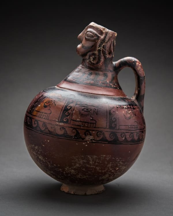Black Painted Earthenware Jar with Anthropomorphic Spout