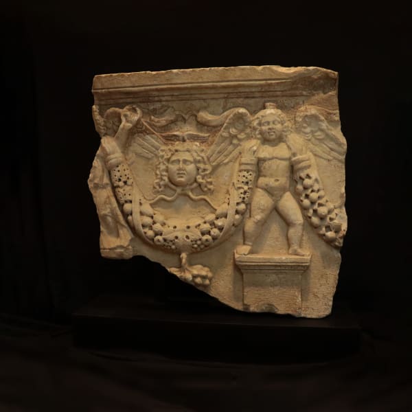 Roman marble fragment of a garland sarcophagus
