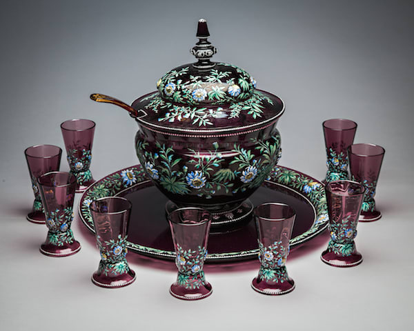 French workshop punch bowl and glasses set, decorated with floral motifs