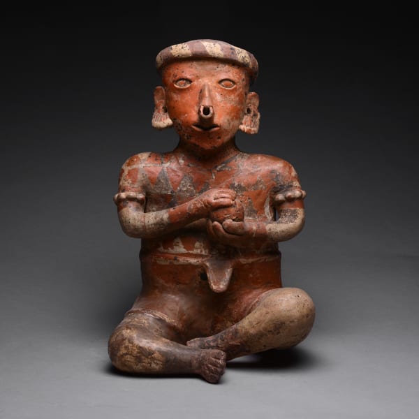 Ixtlán del Rio Style Nayarit Terracotta Sculpture of a Seated Man Holding a Ball